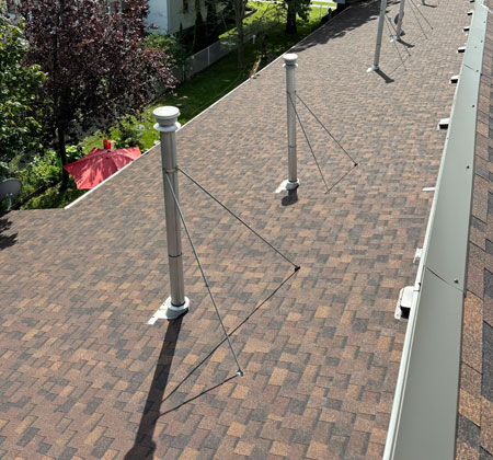 Roofing project with eavestrough installation